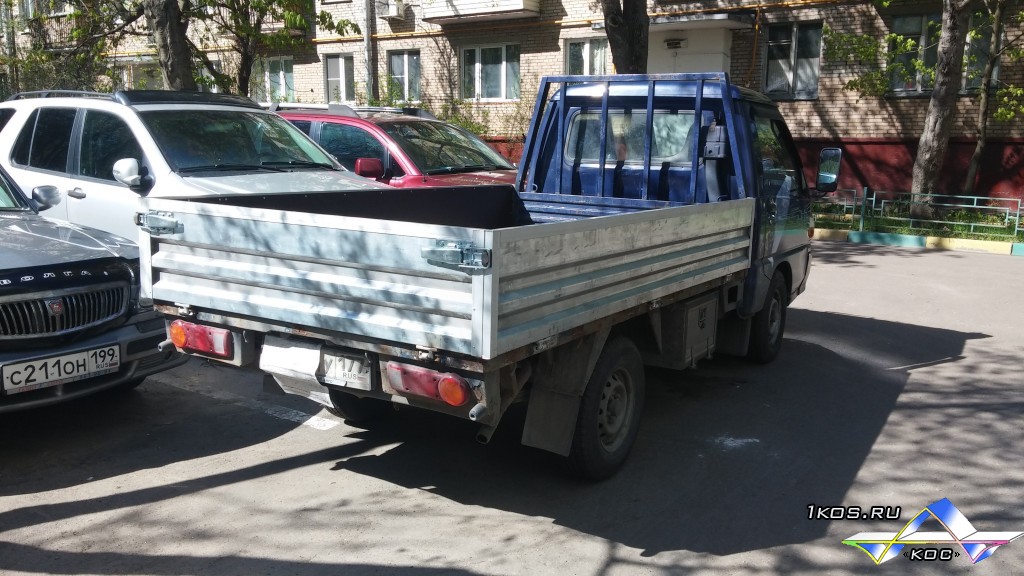 Оцинкованные борта защищены фанерой.