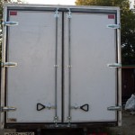Ворота и фургон из алюминиевых композитных панелей.