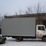 Удлинение кузова "Мерседеса", новые тент, обивка фанерой и ворота.